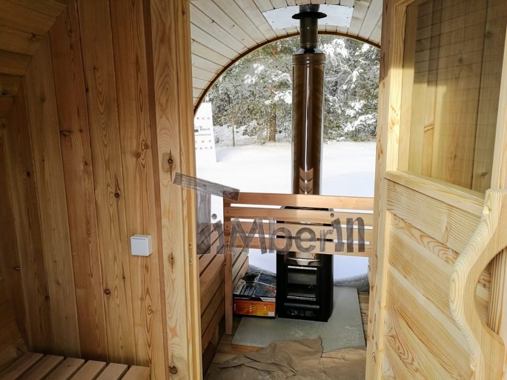 Outdoor barrel sauna with full panoramic window in winter (4)