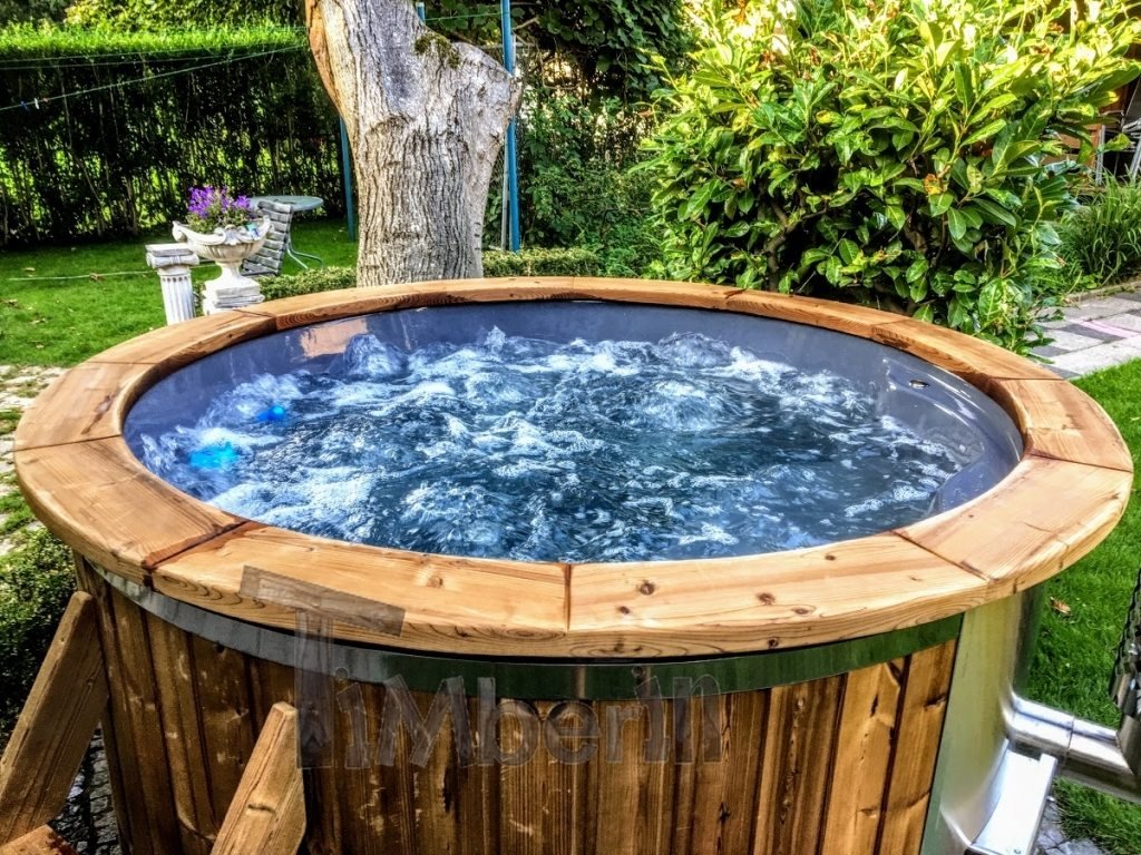 Wooden hot tub with the round edge