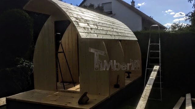 DIY outdoor wooden sauna - assembly of walls